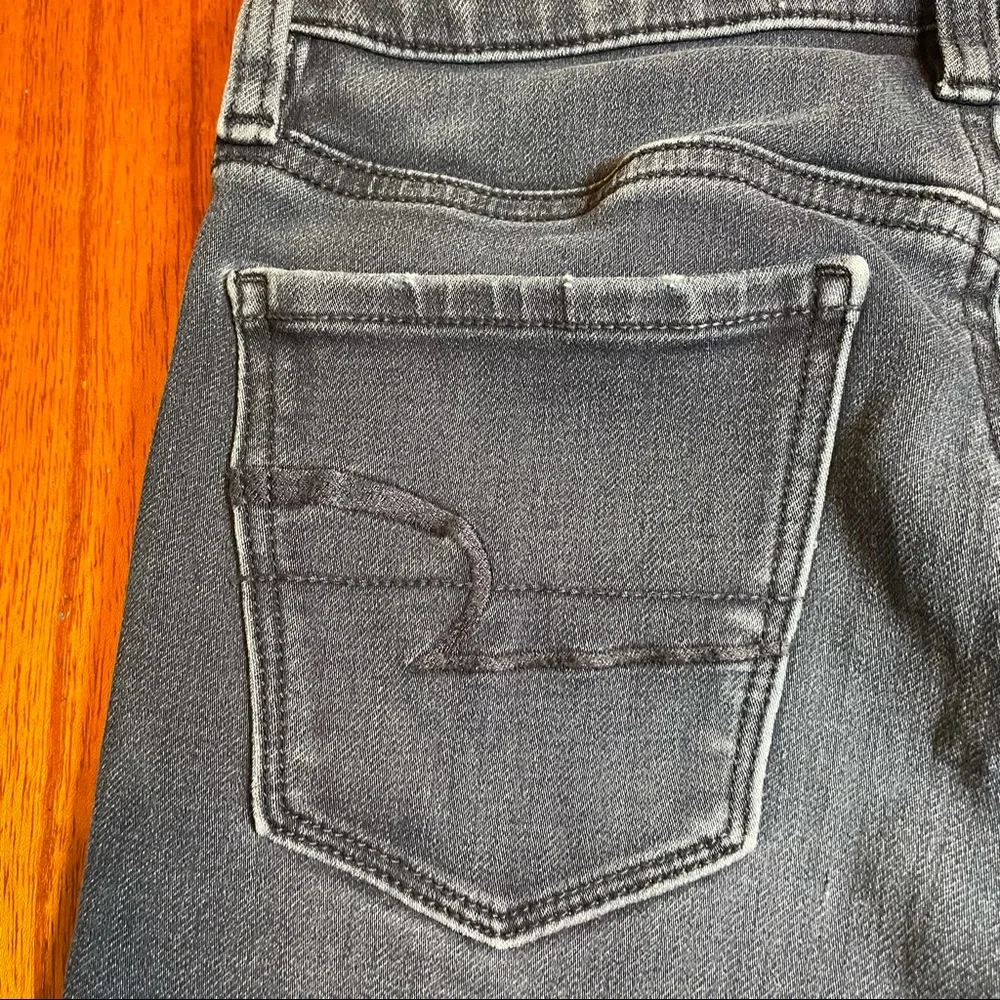 American Eagle distressed hi rise skinny jeggings with raw hem